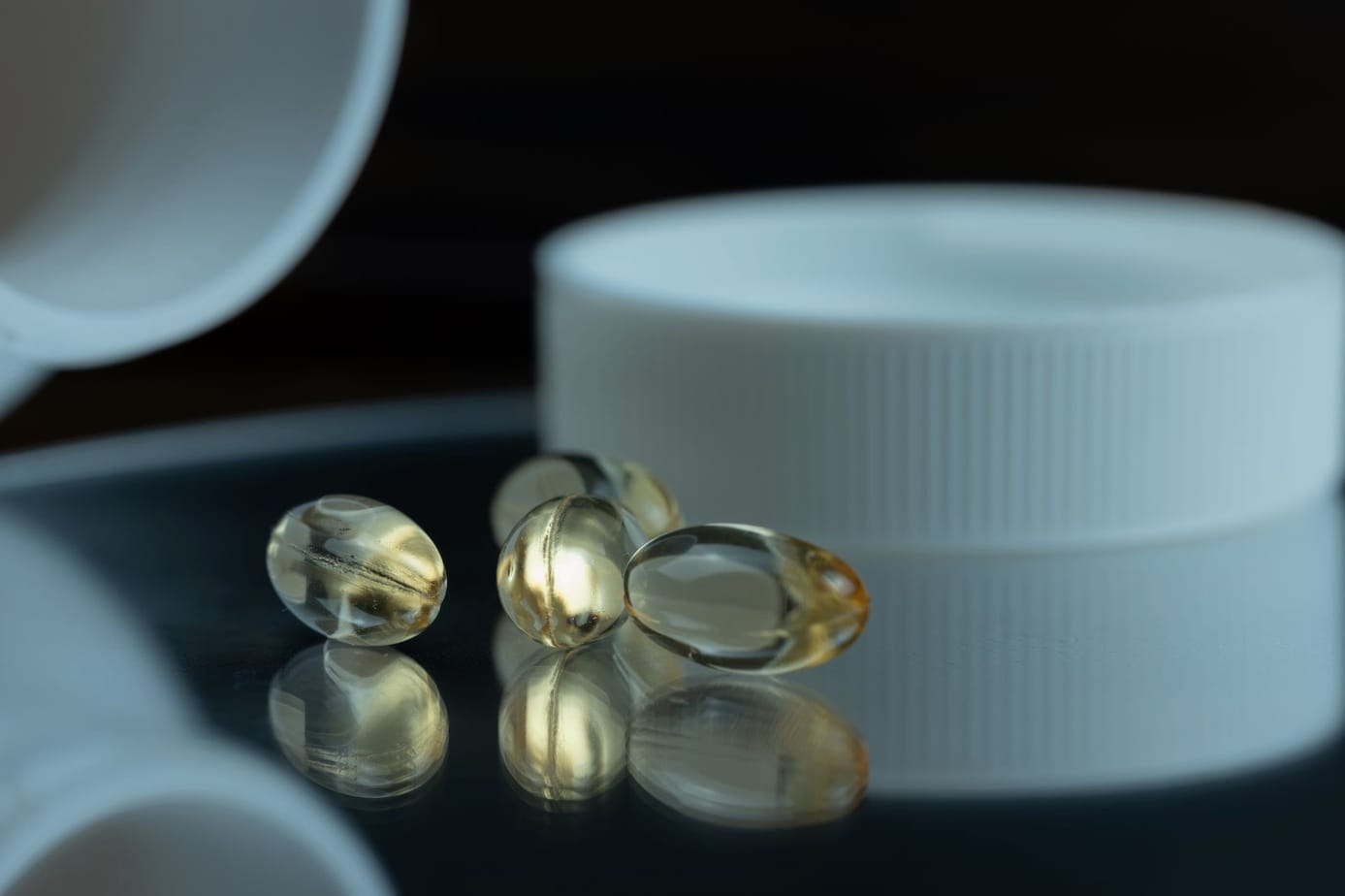 Nutritional capsules moving along a filling line